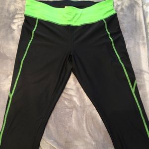 Xersion women’s Capri leggings with lime accents